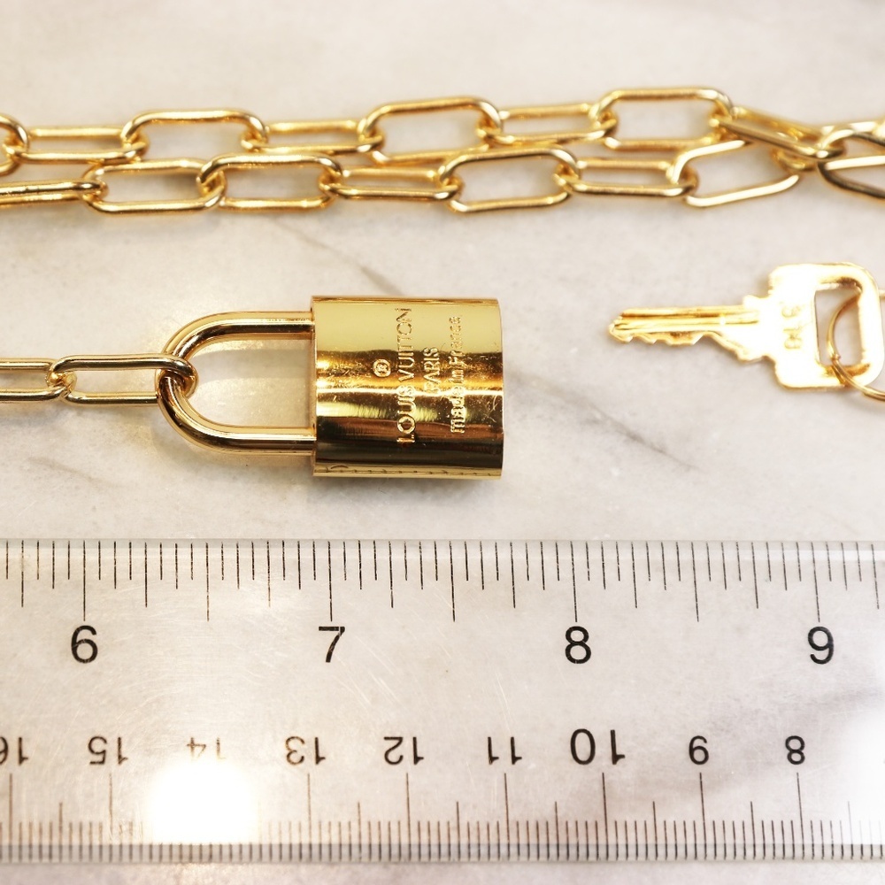 Louis Vuitton Lock Necklace with Gold Tone Chain - Picture 10 of 16